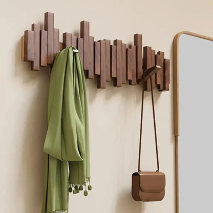 Wandgarderobe Klavierdesign Holz mit klappbaren Haken