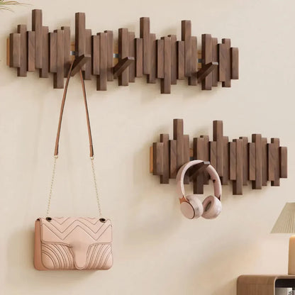 Wandgarderobe Klavierdesign Holz mit klappbaren Haken