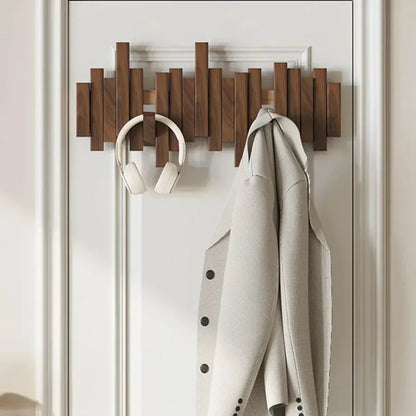 Wandgarderobe Klavierdesign Holz mit klappbaren Haken
